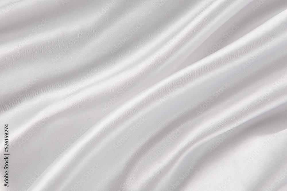 Naklejka premium Smooth elegant white silk or satin luxury cloth texture background.