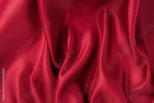 Smooth elegant red silk or satin luxury cloth texture background.