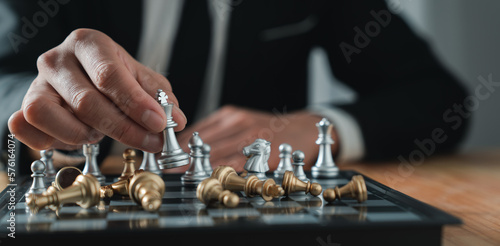 young businessmen. Asian man moving a successful chess piece Strategy concepts and business tactics. Business plans. Teamwork. success management or leadership concepts.