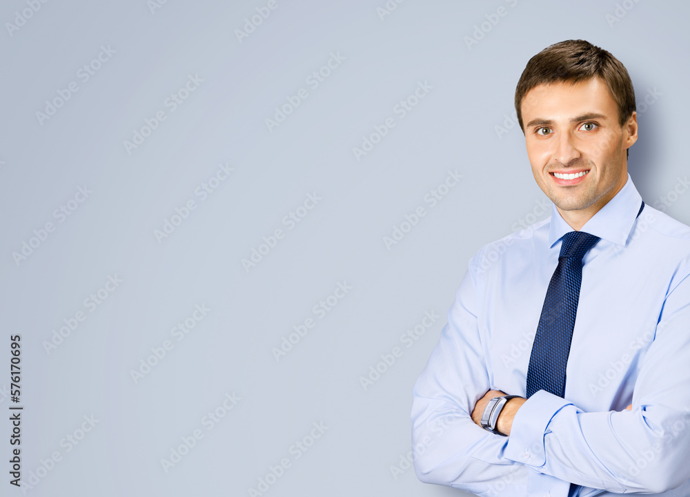 Portrait image - smiling business man in confident cloth, necktie, tie, isolated against grey gray background. Businessman, bank account manager, layer, real estate sales agent. Portrait image - smiling business man in confident cloth, necktie, tie, isolated against grey gray background. Businessman, bank account manager, layer, real estate sales agent.