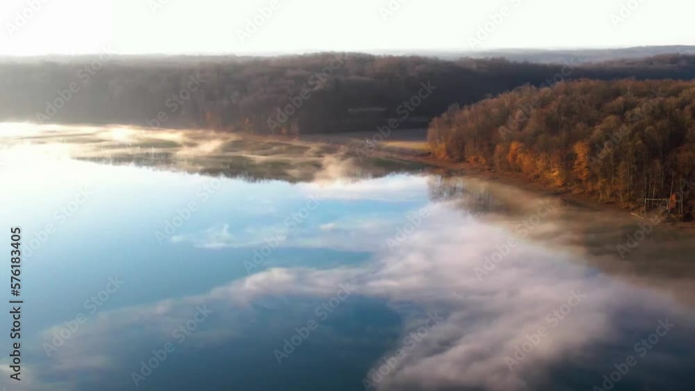 Wide aerial view of Lake Monroe in Indiana on a bright and foggy morning. Wide aerial view of Lake Monroe in Indiana on a bright and foggy morning.