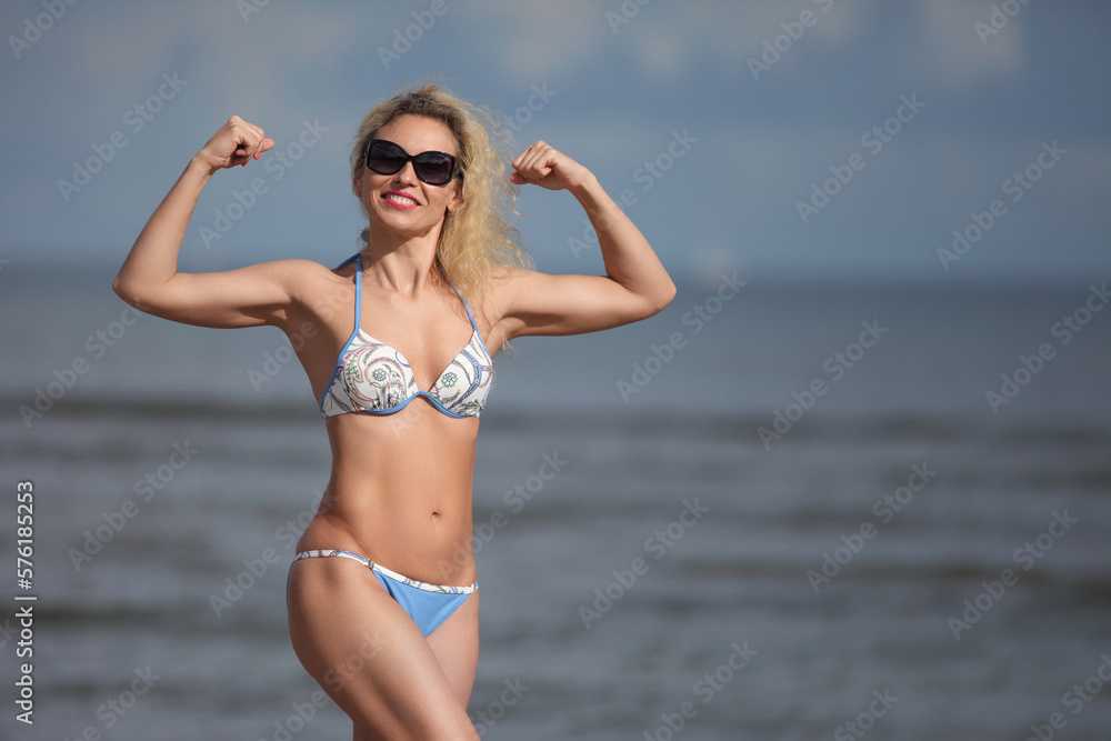 young beautiful woman in swimsuit young beautiful woman in swimsuit