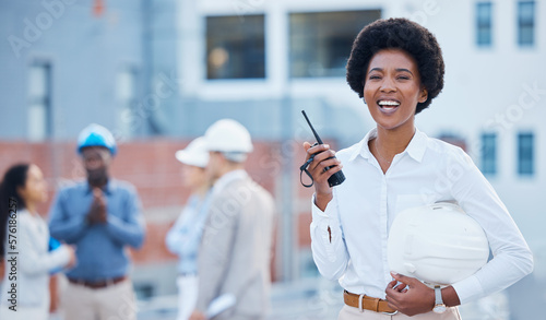 Engineer, walkie talkie and black woman with hard hat, portrait and happiness for new project, real estate or success. Face, African American female manager or employee with communication and outdoor photo