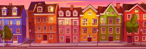 Morning city street with Scandinavian style buildings. Vector cartoon illustration of traditional European houses with chimneys, old wooden windows and doors, trees, lanterns on sidewalk, pink sky