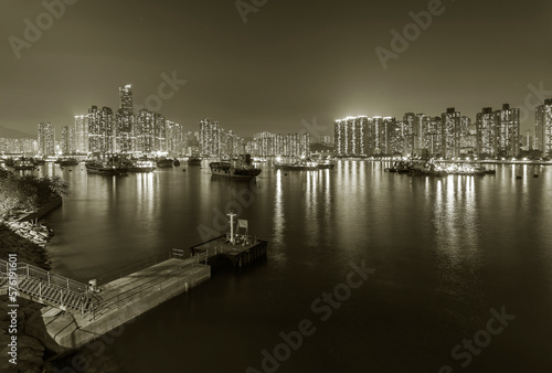 Night scenery of harbor and skyline of Hong Kong city © leeyiutung