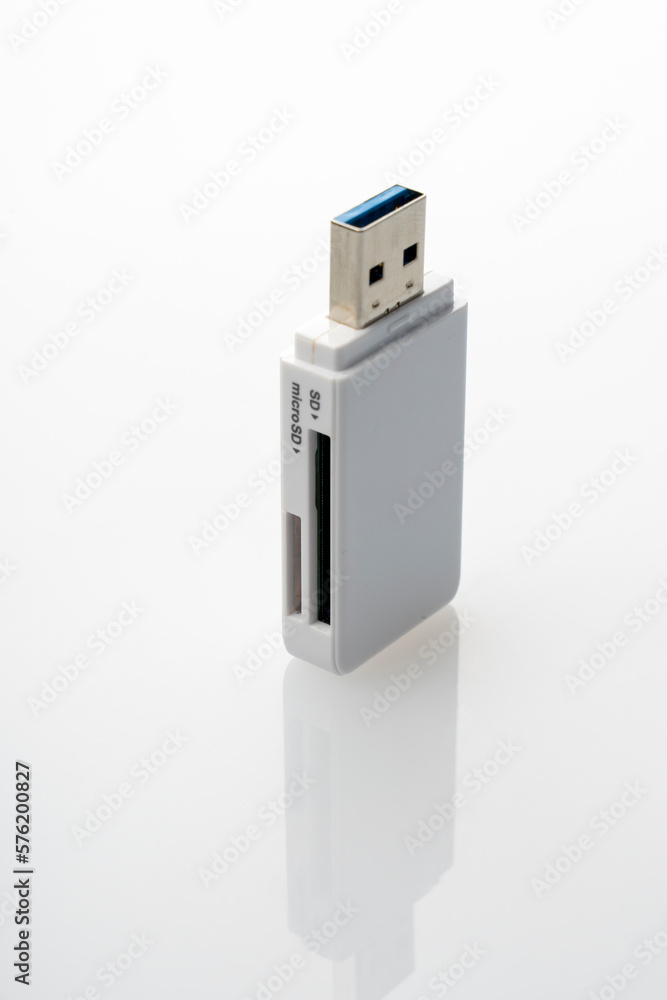 white USB card reader close-up on white background white USB card reader close-up on white background