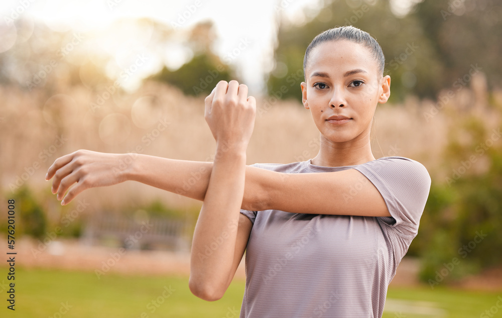 Fitness, portrait and woman stretching arms in nature to get ready for workout, training or exercise. Sports, face and young female athlete stretch and warm up to start exercising, cardio or running. Fitness, portrait and woman stretching arms in nature to get ready for workout, training or exercise. Sports, face and young female athlete stretch and warm up to start exercising, cardio or running.