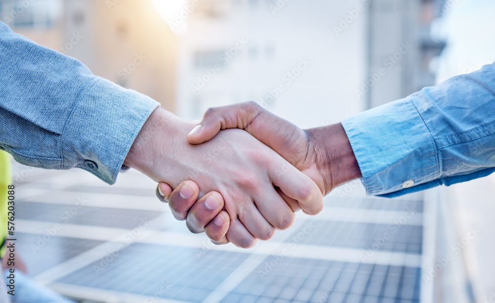 Handshake, engineering and teamwork with people and solar panels for ...