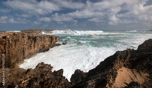 Storm waves crashing onto lava rock coastline at Laie Point coastline at Kaawa on the North Shore of Oahu Hawaii United States