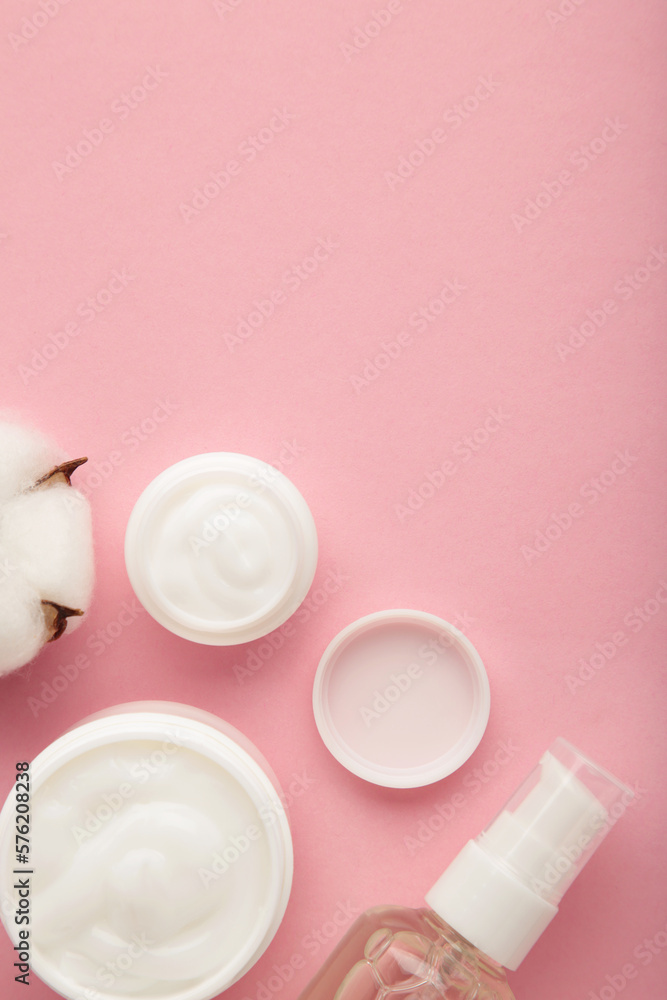 Face cream moisturizer in a jar on pink background. Luxury skincare cosmetics and anti-aging product for healthy skin and beauty routine Face cream moisturizer in a jar on pink background. Luxury skincare cosmetics and anti-aging product for healthy skin and beauty routine
