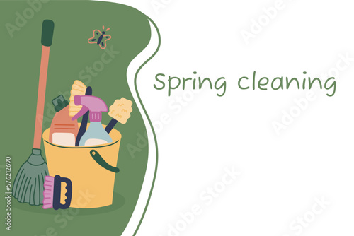Background with the inscription Spring cleaning. A bucket of cleaning products, brushes and a doodle-style mop. Vector illustration.