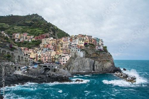 Manarola, Cinque Terre, Liguria, Italy. View of the colorful houses of Manarola village and Cinque Terre Bay.