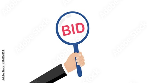 Businessman holding bid in auction bidding for buyers