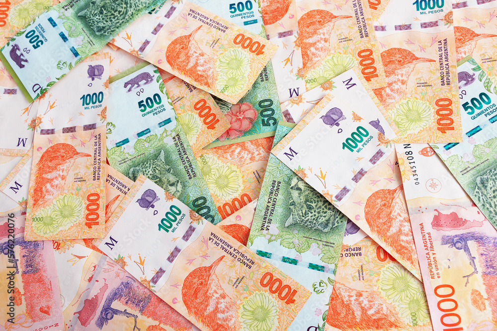 Fototapeta premium 1000 and 500 Argentine pesos Banknotes expanded on a surface