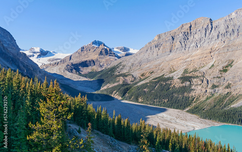 shrinking Payto Glacier becomes Peyto Lake in Banff National Park in Alberta Canada with a clear blue sky in the background
