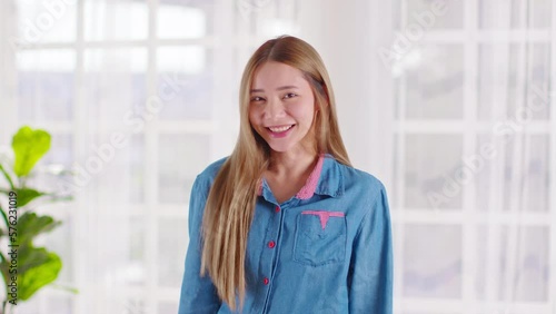 Beautiful and joyful woman with a bright smile and infectious laugh. The essence of happiness, positivity, and simple pleasures of life. for promoting well-being, mental health and carefree lifestyle