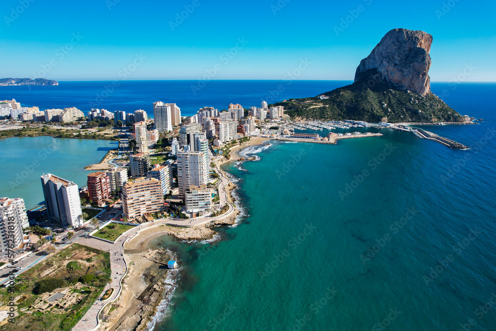 Aerial panoramic view of the beautiful city of Calp in Spain with Peñón de Ifach Parc Natural
