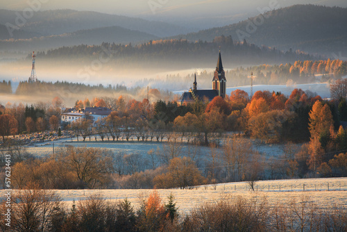 autumn frosty morning overlooking the church in the valley © uranos1980