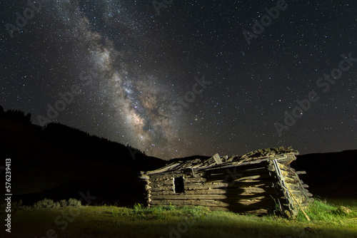 A Cabin Sits Under the Mily Way photo