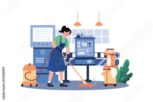 Female worker cleaning floor using a vacuum cleaner