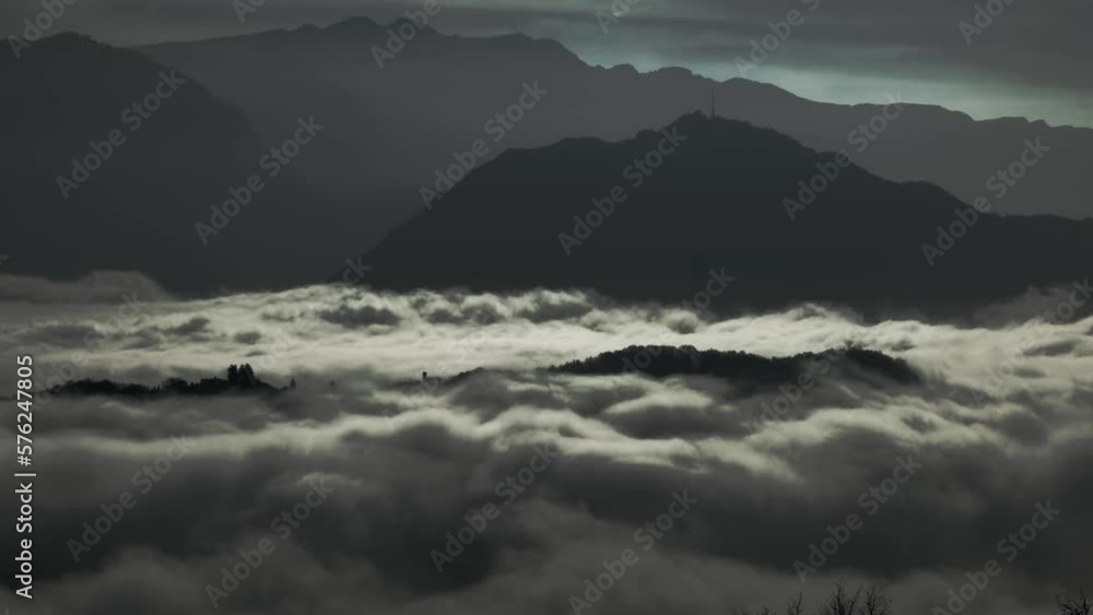 Mountain Peak with a Church Above Cloudscape in a Sunny Day in Lugano, Ticino in Switzerland. Mountain Peak with a Church Above Cloudscape in a Sunny Day in Lugano, Ticino in Switzerland.