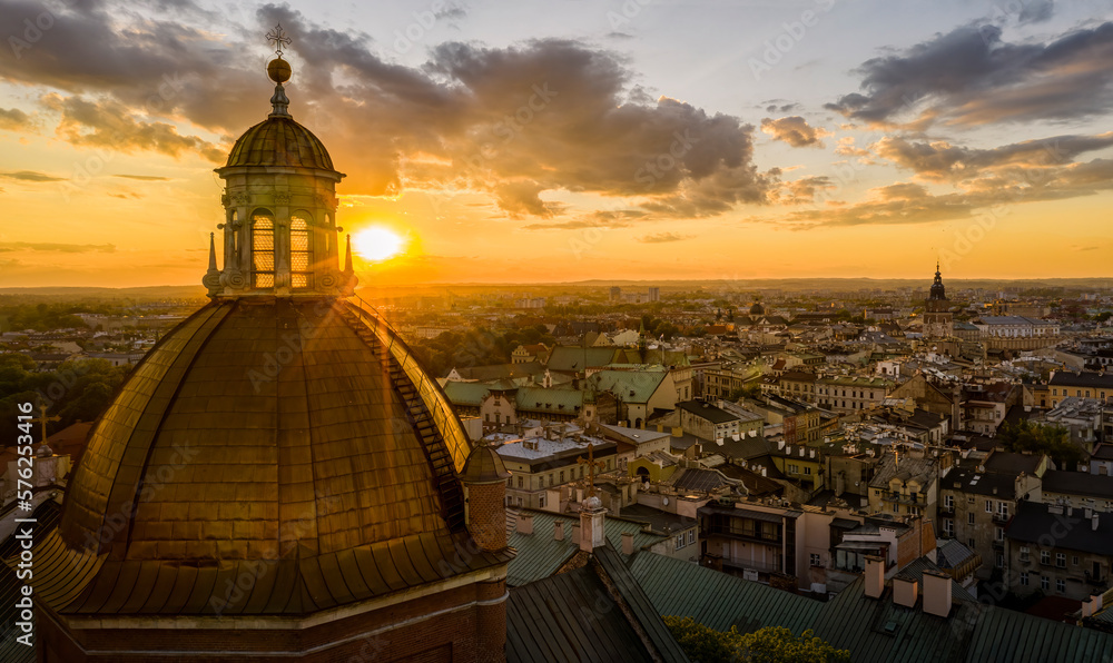 Downtown in Krakow during beautiful sunset, view over Church of Saints Peter and Paul, Poland