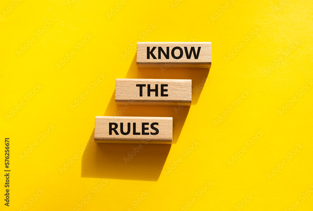 Know the rules symbol. Wooden blocks with words Know the rules. Beautiful yellow background. Business and Know the rules concept. Copy space. Know the rules symbol. Wooden blocks with words Know the rules. Beautiful yellow background. Business and Know the rules concept. Copy space.