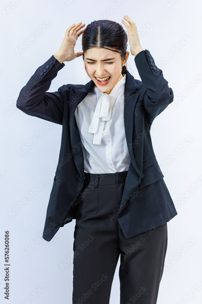 Portrait isolated cutout studio shot Millennial Asian professional successful female businesswoman in formal business suit holding hands on head having headache shouting on white background Portrait isolated cutout studio shot Millennial Asian professional successful female businesswoman in formal business suit holding hands on head having headache shouting on white background