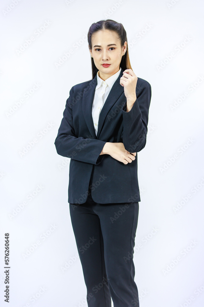 Portrait isolated cutout studio shot of Millennial Asian professional successful female businesswoman lawyer ceo in formal business suit posing smiling on white background Portrait isolated cutout studio shot of Millennial Asian professional successful female businesswoman lawyer ceo in formal business suit posing smiling on white background