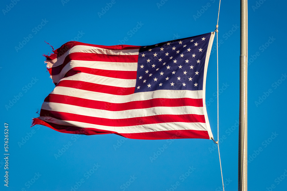 Fototapeta premium American Flag Waving in the Wind at Petrified Forest National Park