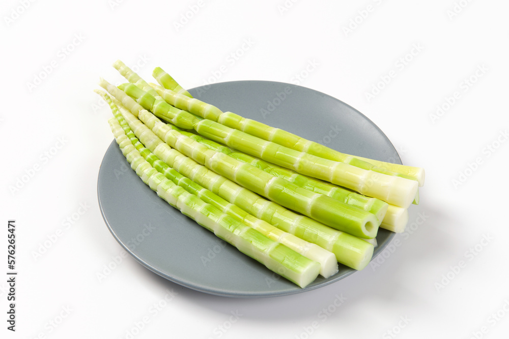 Peeled green bamboo shoots isolated on white background. Peeled green bamboo shoots isolated on white background.