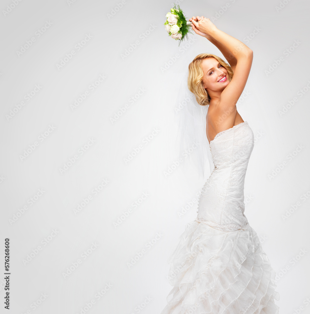 Get ready to catch the bouquet. Gorgeous young bride getting ready to throw her bouquet. Get ready to catch the bouquet. Gorgeous young bride getting ready to throw her bouquet.