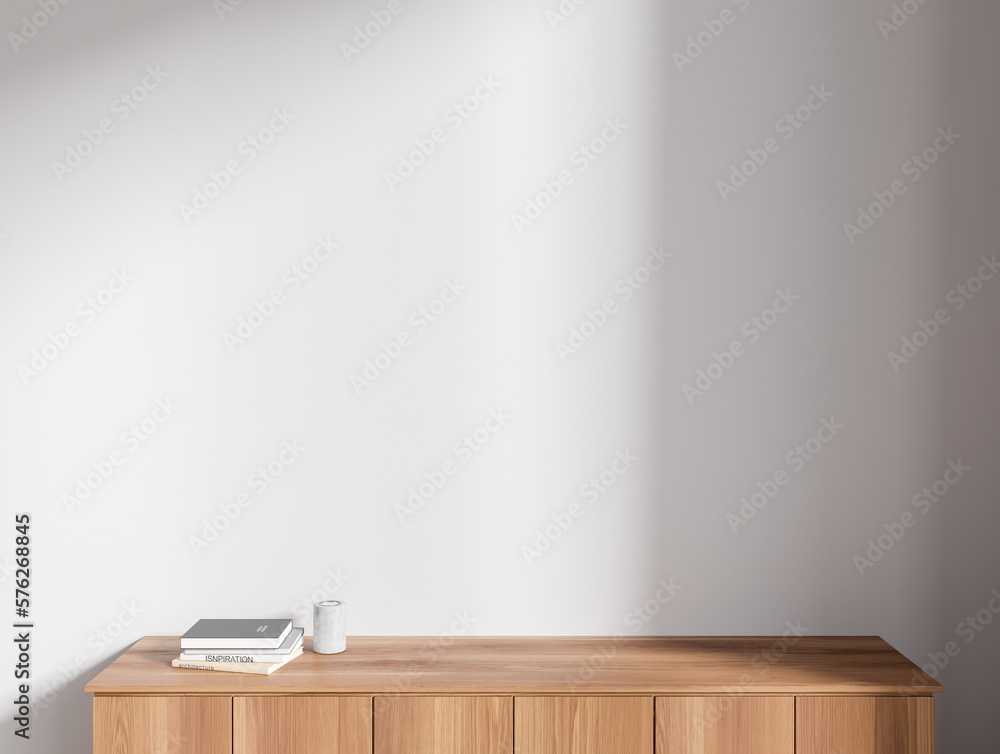 Dark wooden cabinet near white wall - obrazy, fototapety, plakaty 