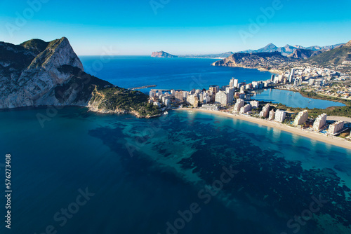 Aerial panoramic view of the beautiful city of Calp in Spain with Peñón de Ifach Parc Natural photo