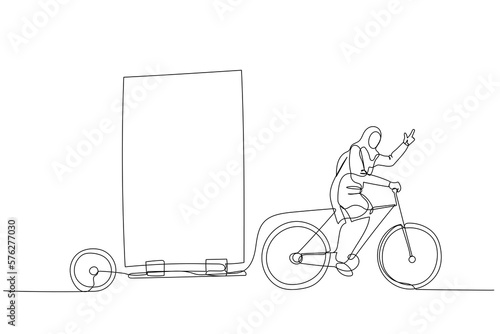 muslim woman riding bicycle with billboard trailer concept of outdoor advertisement