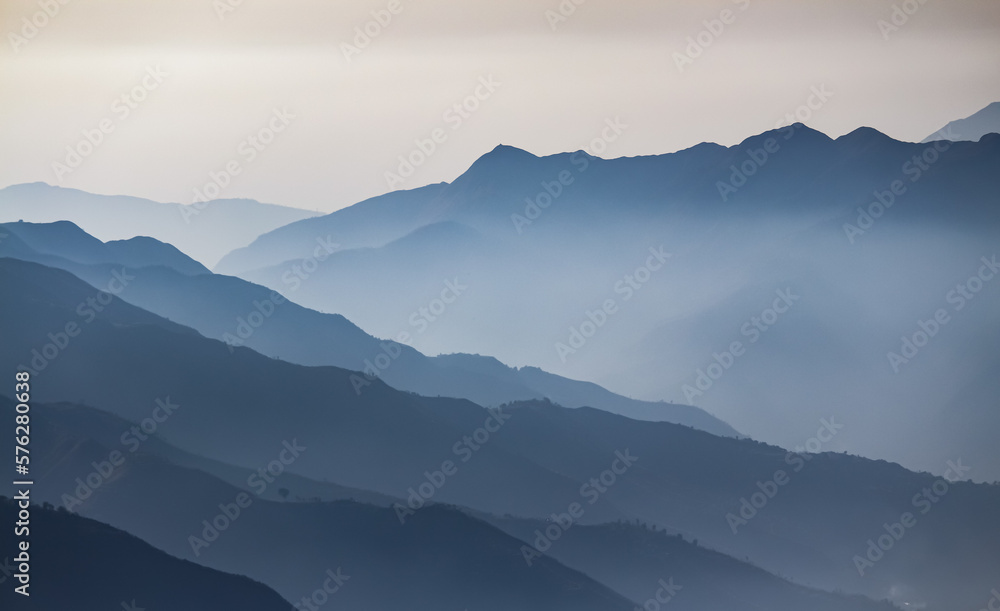 A layered of foggy mountains A layered of foggy mountains