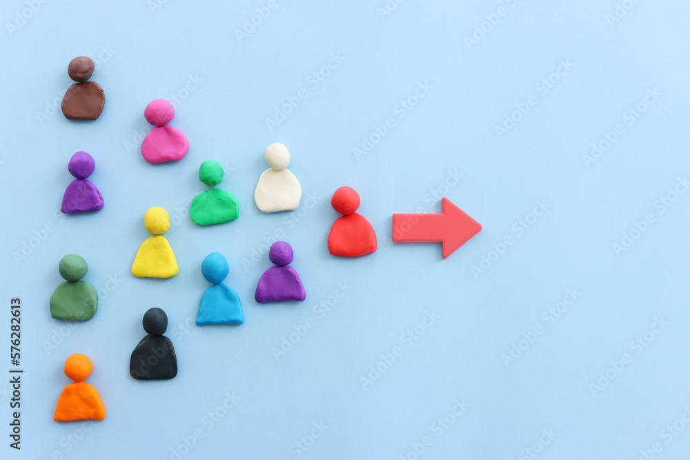 Red arrow and people figures. Leadership and growth concept