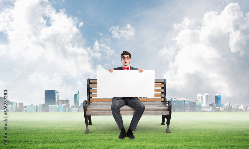 businessman with an empty banner businessman with an empty banner
