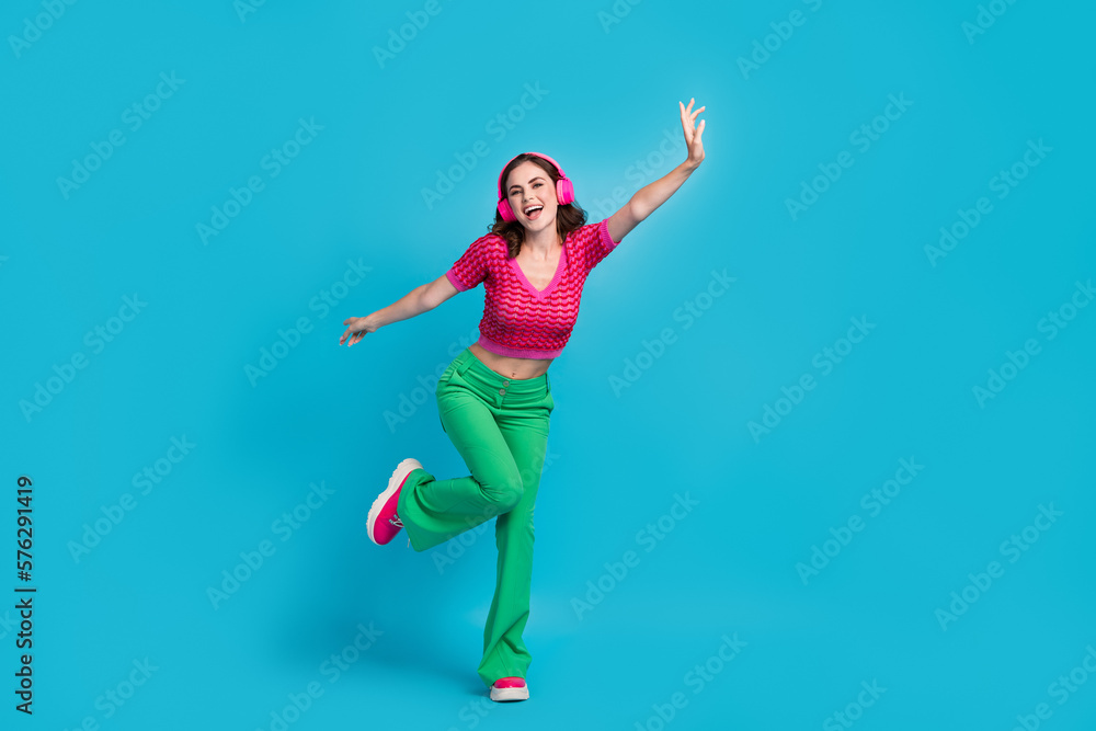 Full length photo of cheerful lovely lady wear trendy retro clothes chill vibe summer party empty space isolated on blue color background