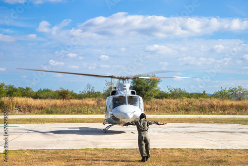 Nakhon Ratchasima, Thailand - DEC, 2021 : Thai Police Aviation Division Bell 412EPI Helicopter Landing at Central Training Center Nong Sarai. photo