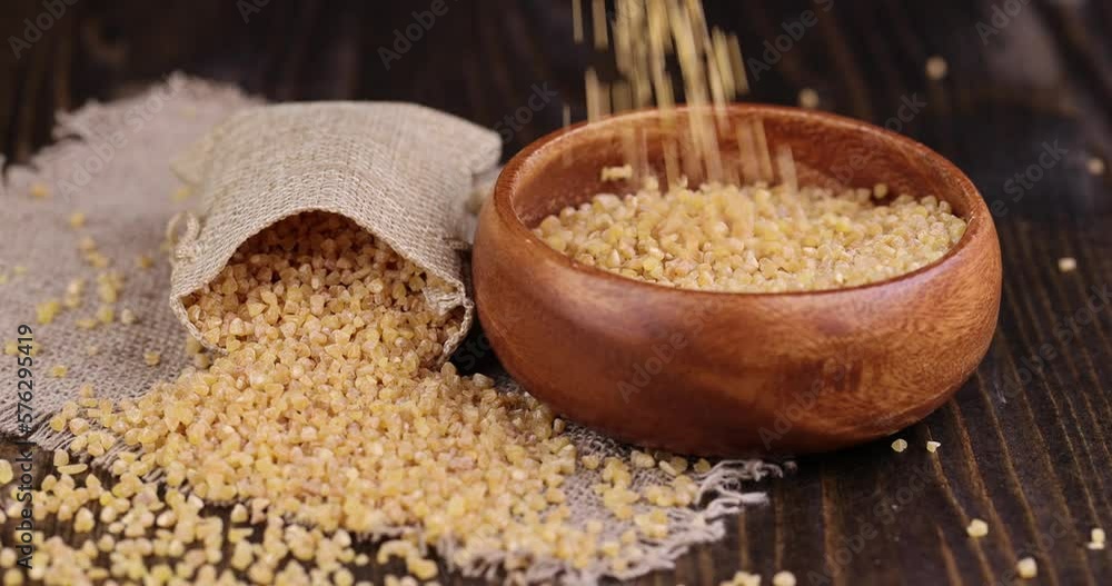 Pour and serve raw wheat porridge, crushed wheat grain for cooking porridge Pour and serve raw wheat porridge, crushed wheat grain for cooking porridge