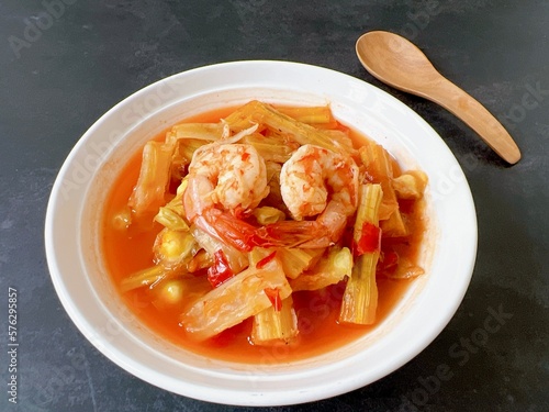 Top view Thai Moringa curry with shrimp, hot and sour flavour. (Kaeng som marum) photo