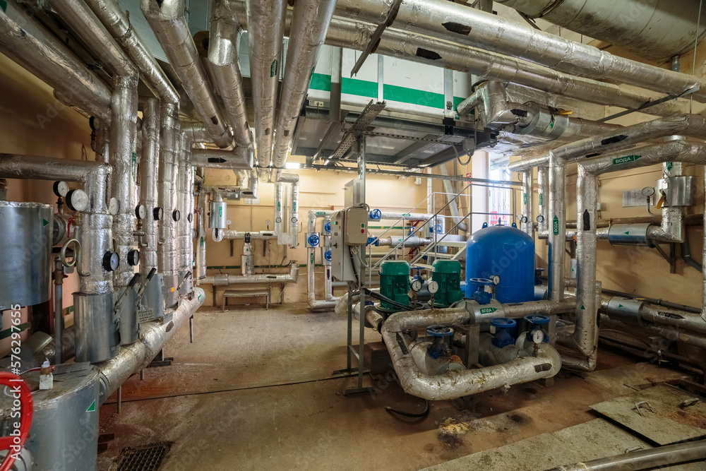 Industrial switching of heating pipes in the basement with a pumping station Industrial switching of heating pipes in the basement with a pumping station