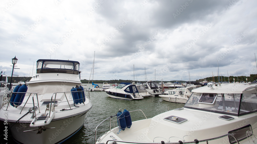 Yachts on sea on the background of cloudy sky Yachts on sea on the background of cloudy sky