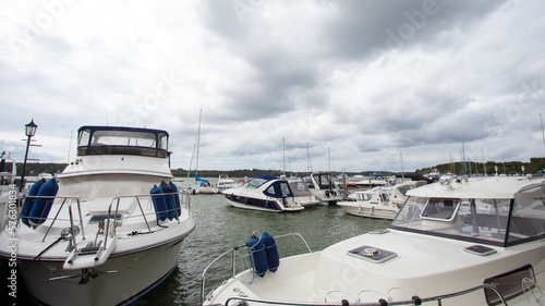 Yachts on sea on the background of cloudy sky © millaf