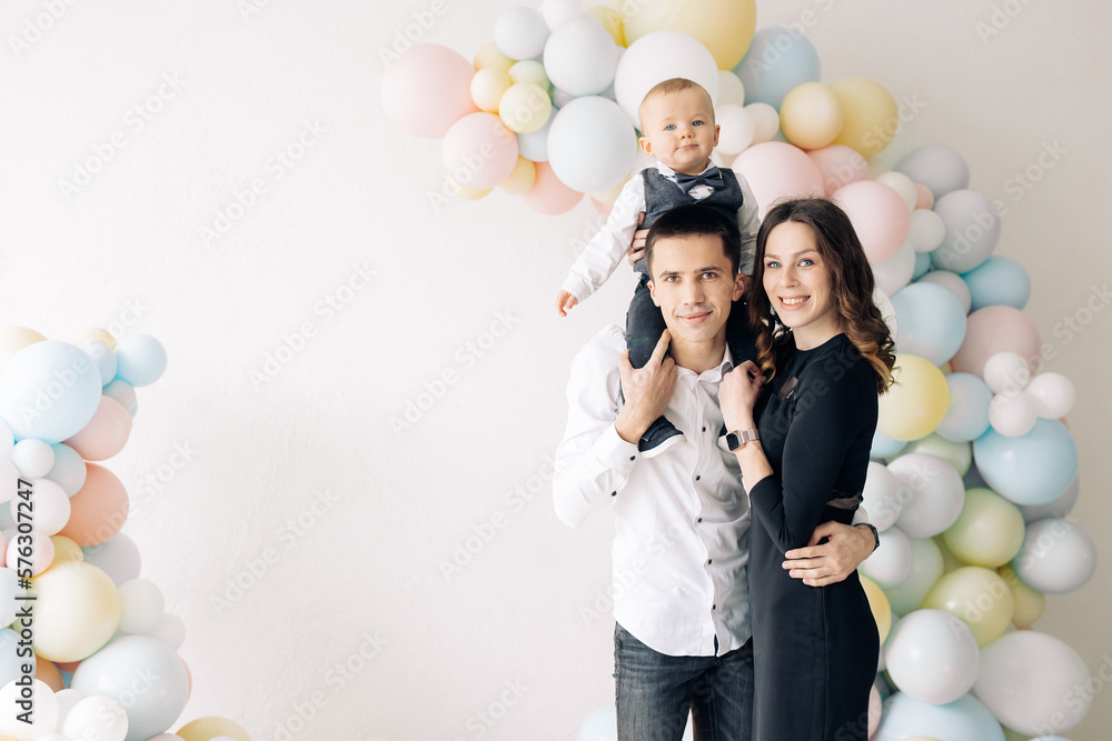Fototapeta premium Happy family celebrates first birthday of baby boy.