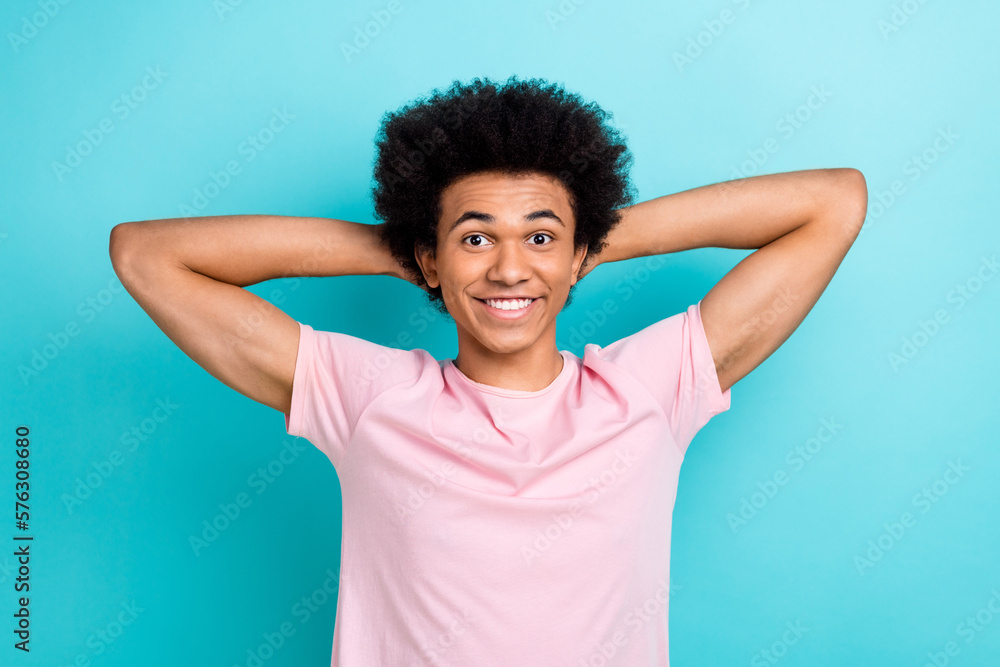 Portrait of young man wear pink t-shirt hands head relax time after hard college day education tired pause isolated on aquamarine color background