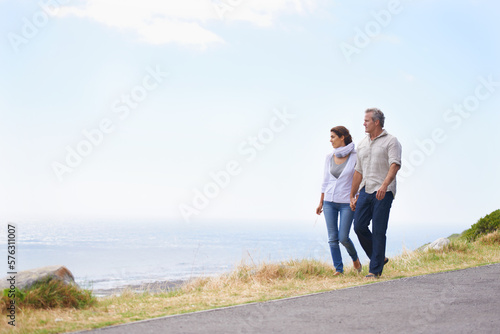 Appreciating one another. A happy mature couple with their heads together affectionately.