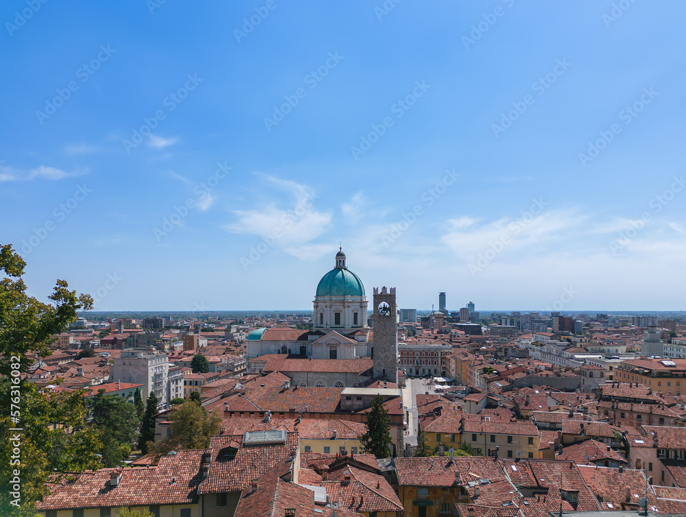 Drone view of the old town of Brescia and the central Cathedral of Santa Maria Assunta with a dome and bell tower. Lombardy, Italy
