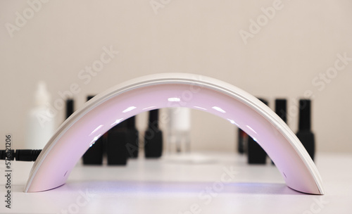 Ultraviolet LED lamp for drying gel nail polish and jars with gel polishes. Manicure and pedicure.